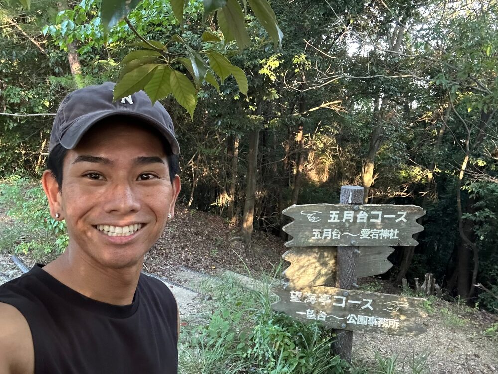 外間トレーナの笑顔写真
