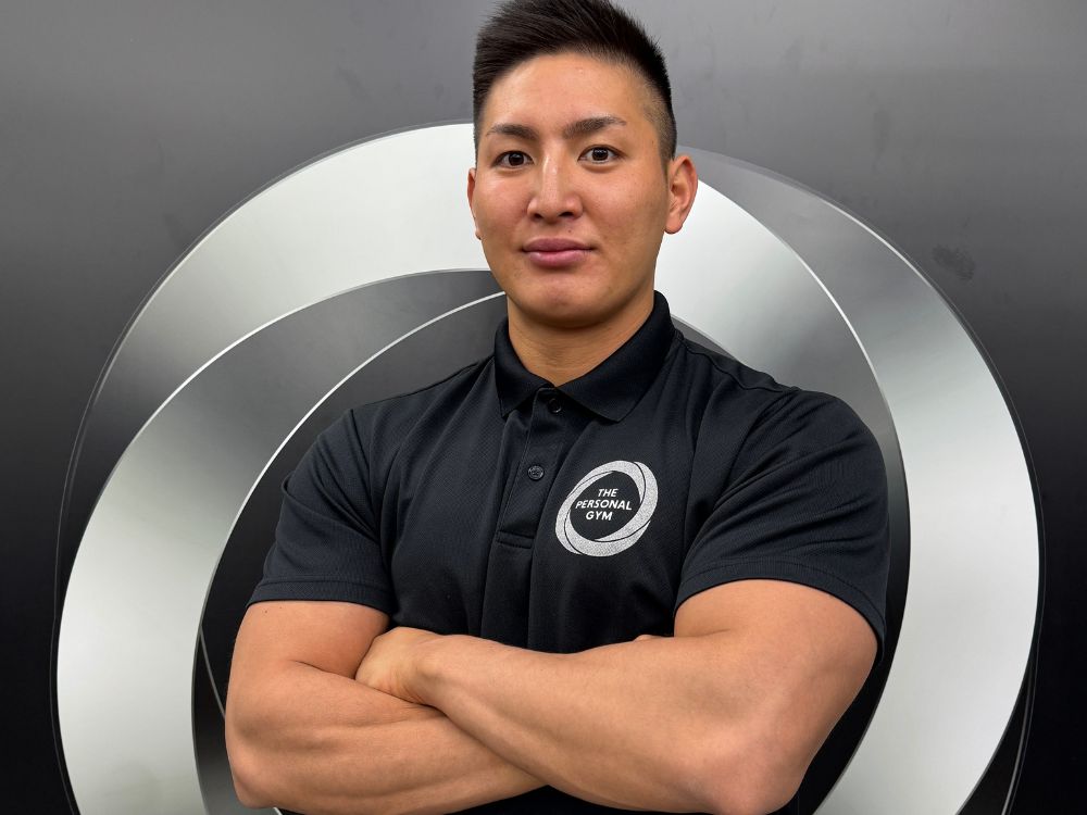 THE PERSONAL GYM門前仲町店の新人小泉トレーナー。前職消防士として7年勤務し、門前仲町でパーソナルトレーニングを担当