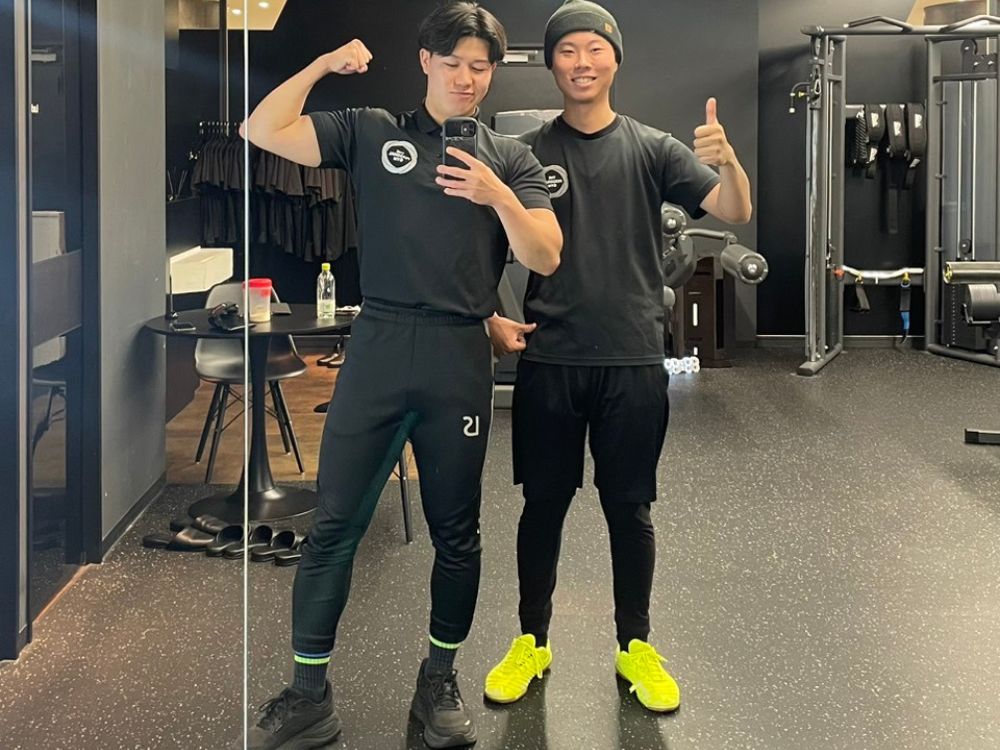 トレーナー伊藤とお客さんの写真