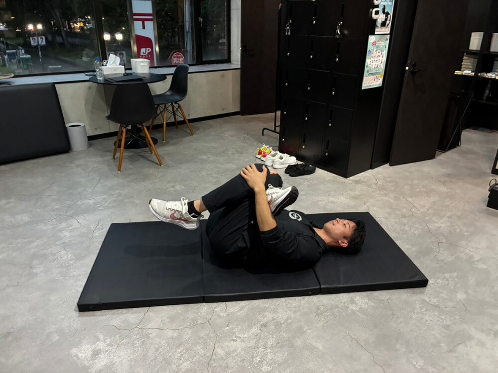 臀筋のストレッチの写真